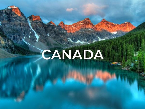 Category selection image that says "Canada" with a photo of some mountains reflected in the lake in front of them.