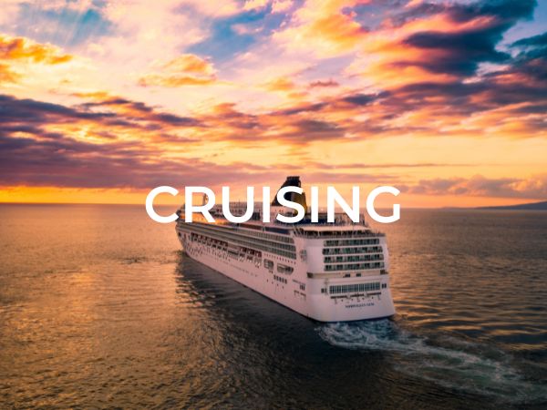 Category selection image that says "Cruising" with a photo of a cruise ship sailing in the sunset.